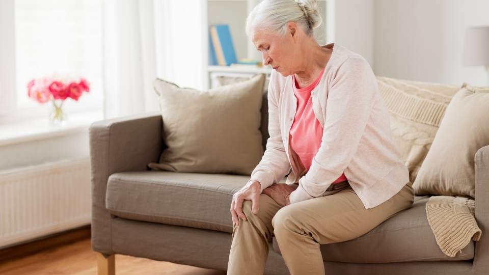 Older woman with knee pain