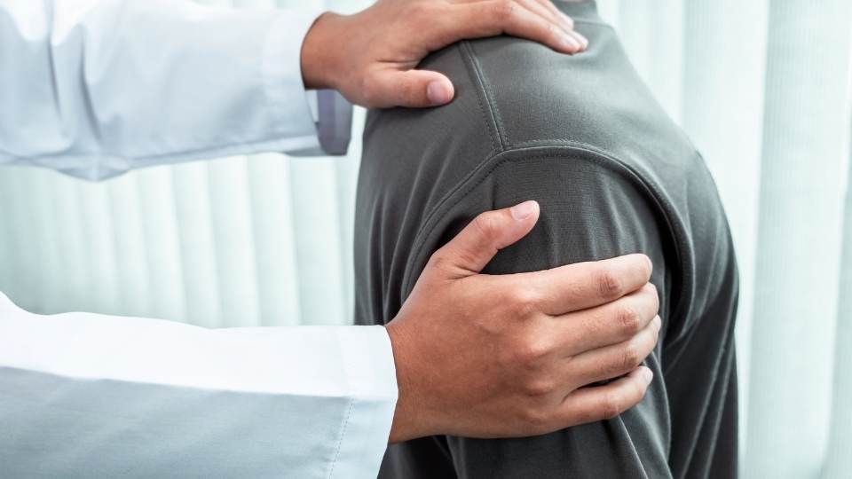 Man Treating Dislocation