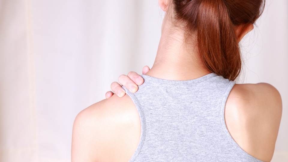 Woman with shoulder bursitis