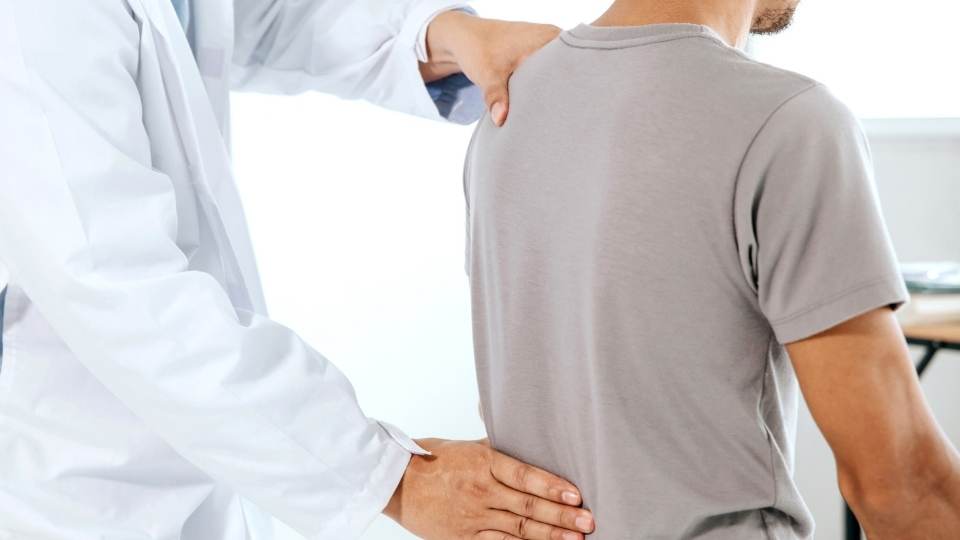 Man getting treatment for Spinal Stenosis