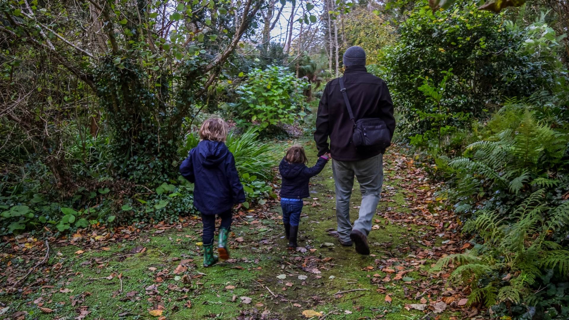 man walking with kids