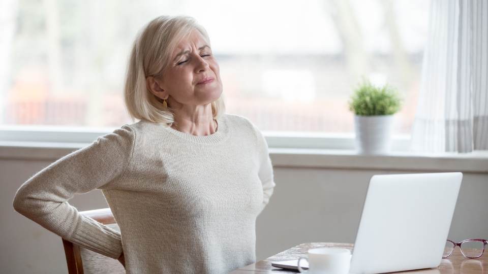woman with back due to gout dublin physio & chiropractic