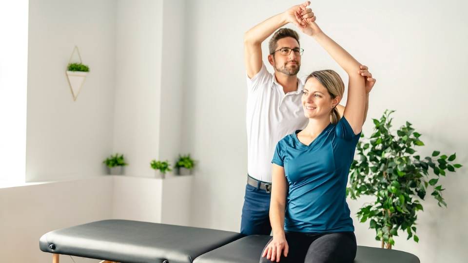 woman getting physio for a humeral fracture dublin physio & chiropractic