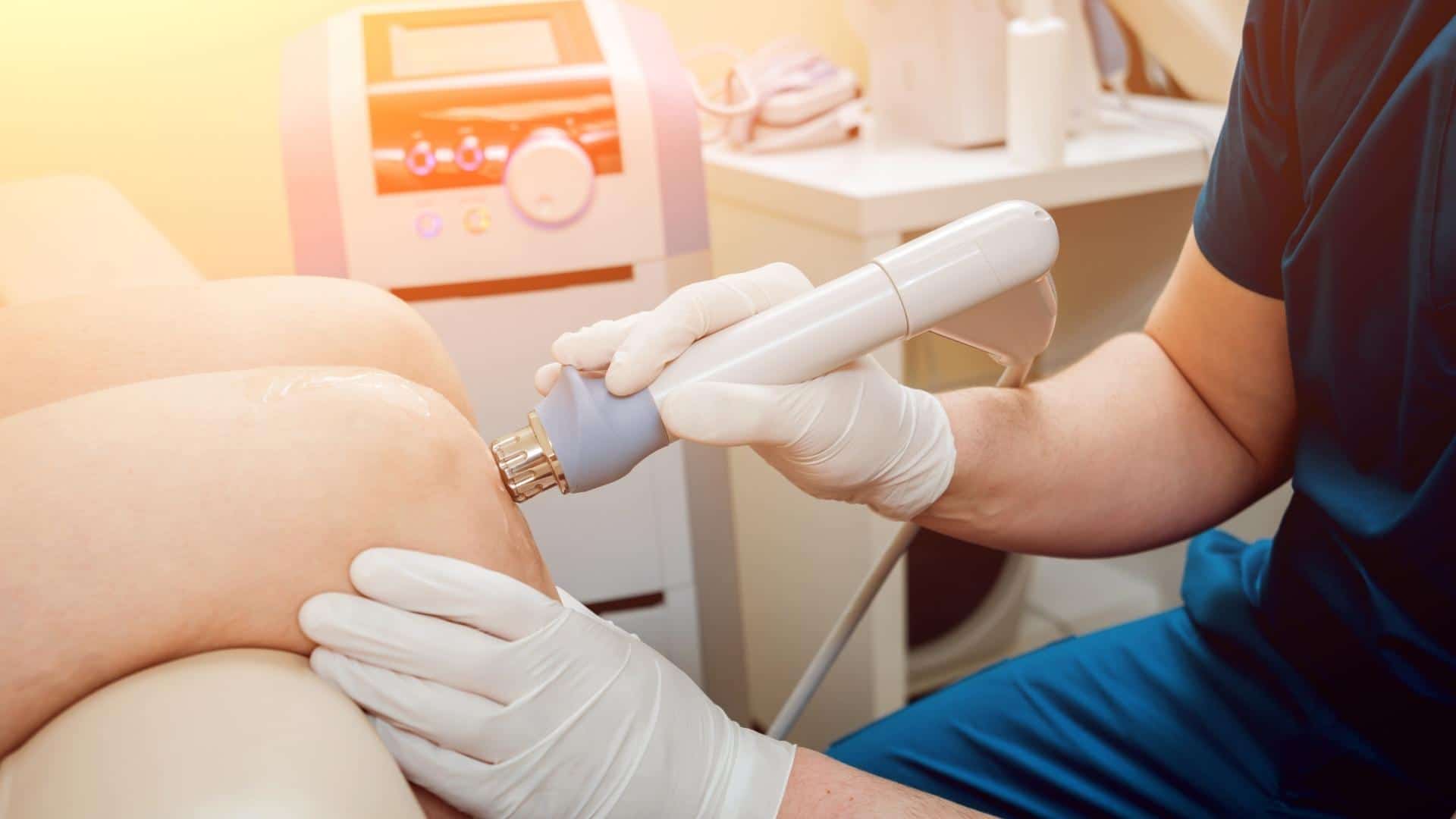 person receiving laser therapy for pain relief