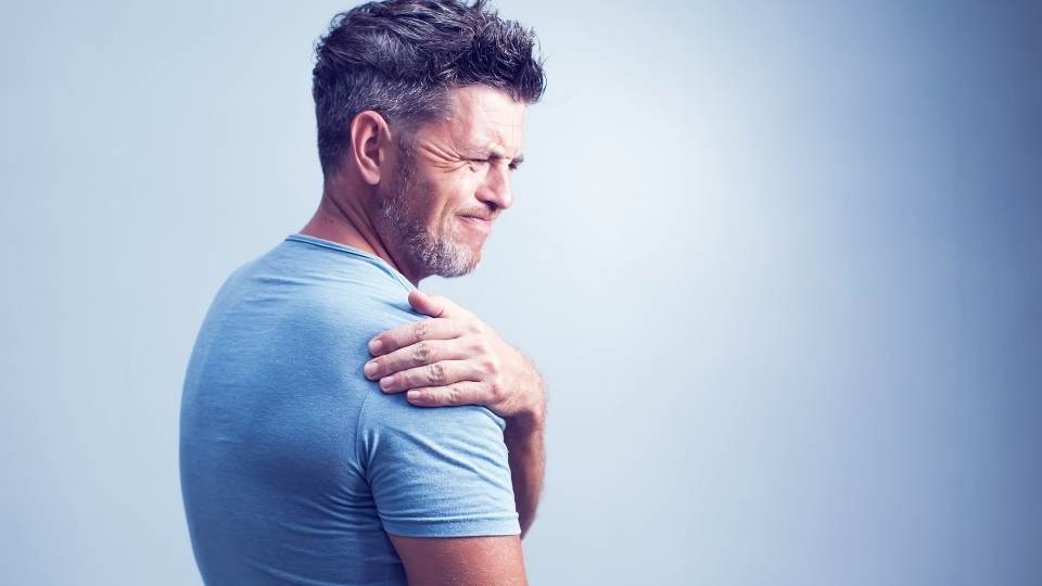 man with shoulder pain swimmer's shoulder 