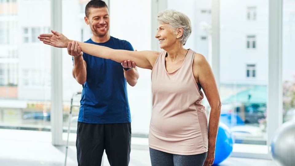 Woman getting physio for swimmer's shoulder 