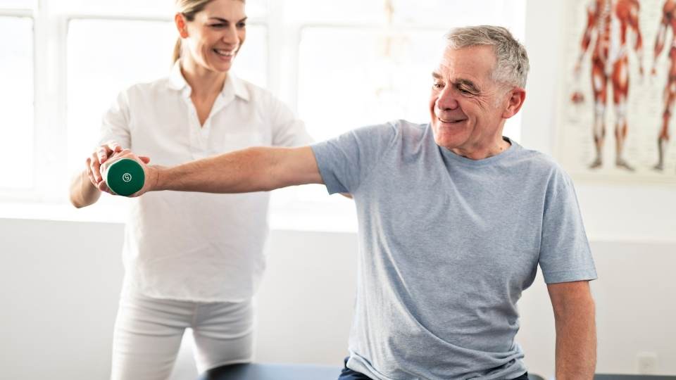 man receiving physio for swimmer's shoulder
